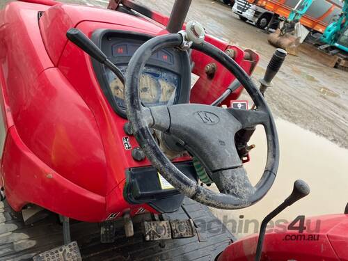 caption Mahindra 7520 Tractor/ Loader (4 x 4)