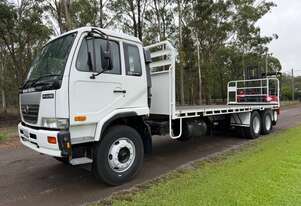 2007 Nissan UD with 12 pallet tray, pre emission, 9 speed synchro, 460k kms with Moffett M7