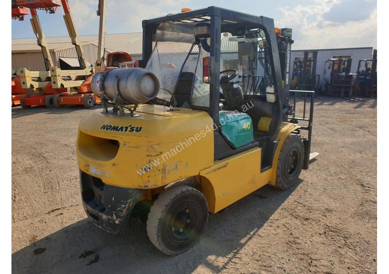 caption Komatsu 4 Ton forklift plus 3 attachments