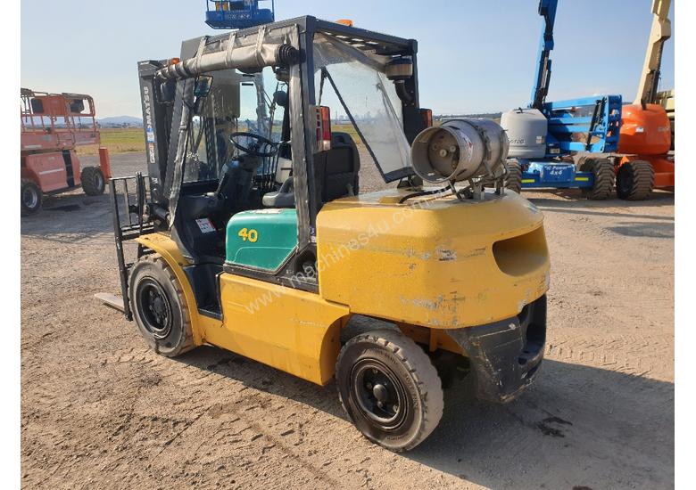 caption Komatsu 4 Ton forklift plus 3 attachments