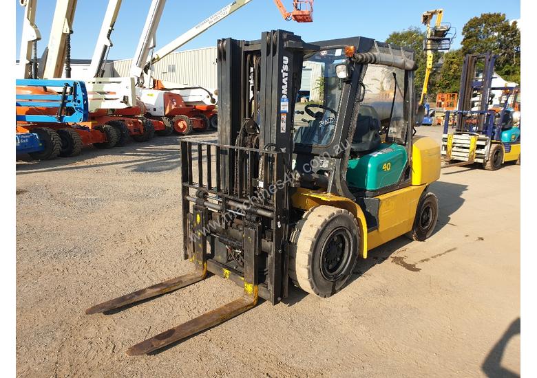 caption Komatsu 4 Ton forklift plus 3 attachments