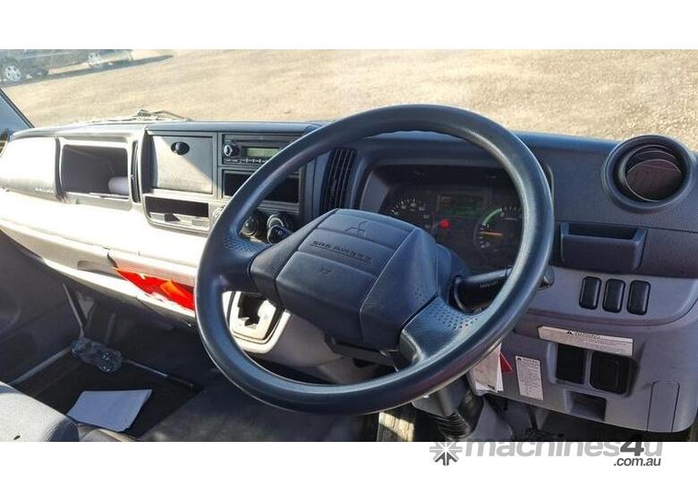 caption Mitsubishi Canter