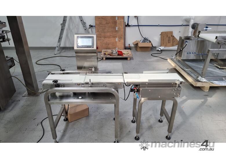 caption CHECKWEIGHER FOR FOOD ITEMS