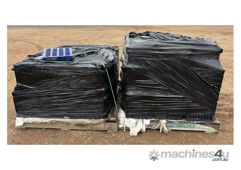 caption QTY X 2 PALLETS OF RUBBER WEAR PLATES