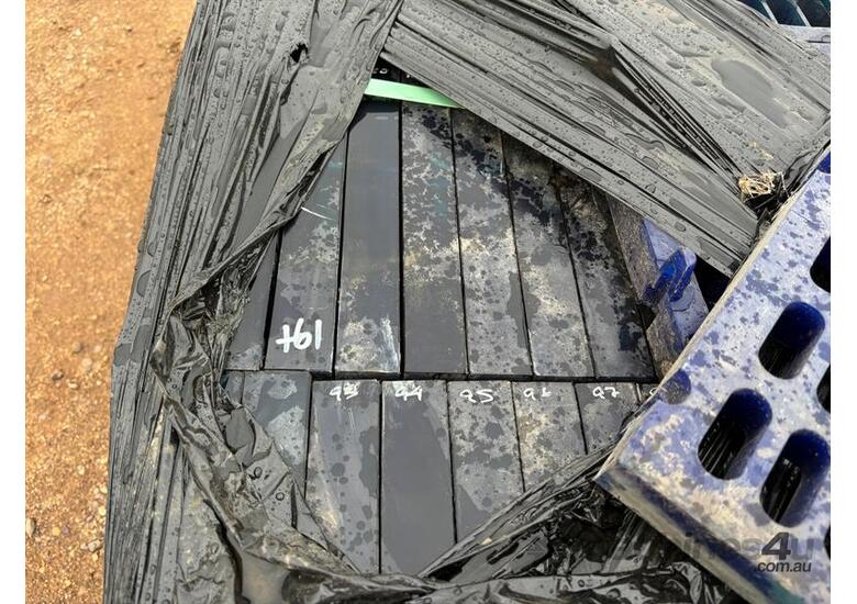 caption QTY X 2 PALLETS OF RUBBER WEAR PLATES