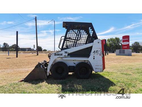 caption Bobcat 463 with Steel Trailer