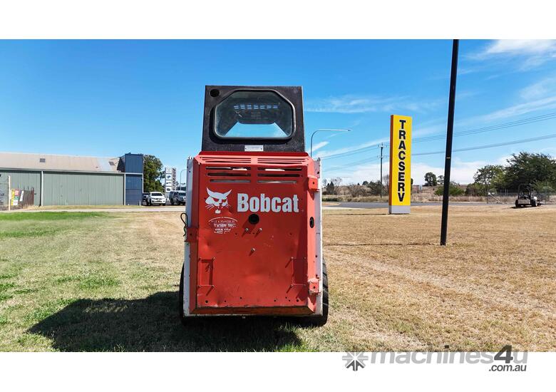 caption Bobcat 463 with Steel Trailer