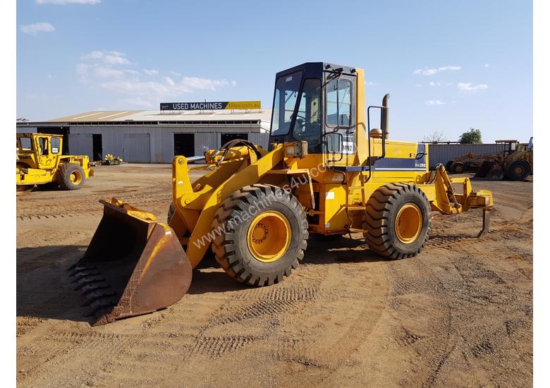 caption 1994 Komatsu WA250-1 Wheel Loader *CONDITIONS APPLY*