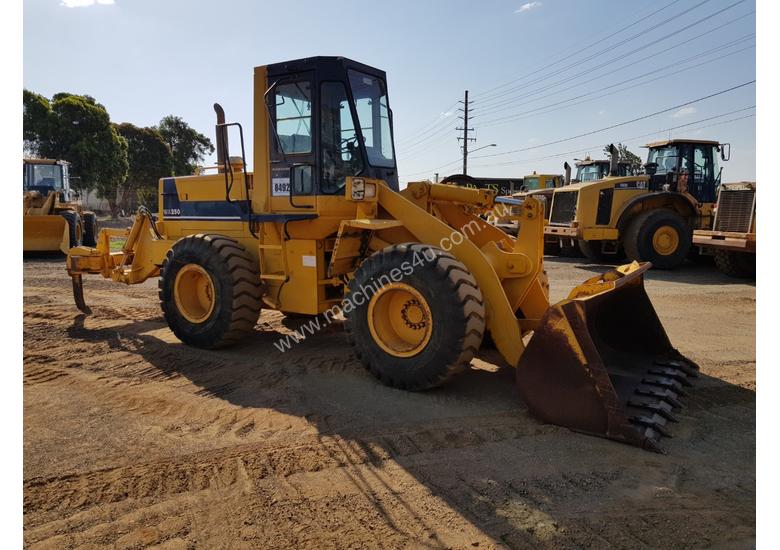 caption 1994 Komatsu WA250-1 Wheel Loader *CONDITIONS APPLY*