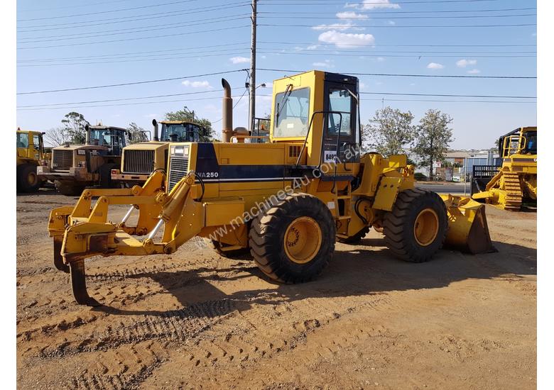 caption 1994 Komatsu WA250-1 Wheel Loader *CONDITIONS APPLY*