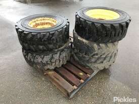 5 x Bobcat Wheels f/w Tyres - picture0' - Click to enlarge