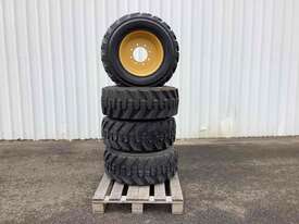 4 x caterpillar Skidsteer wheels & tyres - picture0' - Click to enlarge