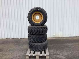 4 x caterpillar Skidsteer wheels & tyres - picture1' - Click to enlarge