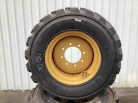 4 x caterpillar Skidsteer wheels & tyres - picture2' - Click to enlarge