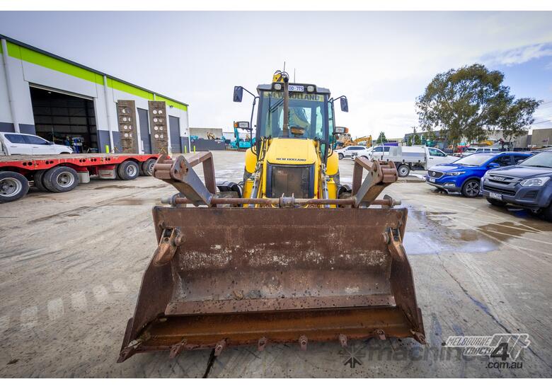 caption NEW HOLLAND B110B BACKHOE