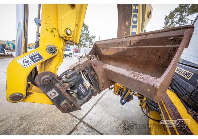 caption NEW HOLLAND B110B BACKHOE