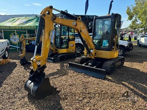 caption 31.6HP 2021 Caterpillar 303.5E CR Mini Excavator – Ideal for Compact Excavation & Landscaping!