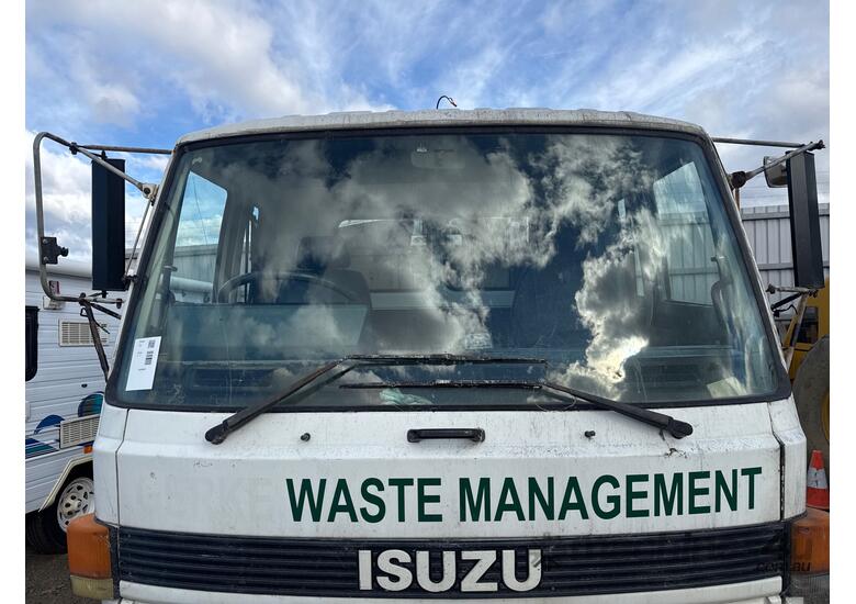 caption 1992 Isuzu FSR Garbage Compactor
