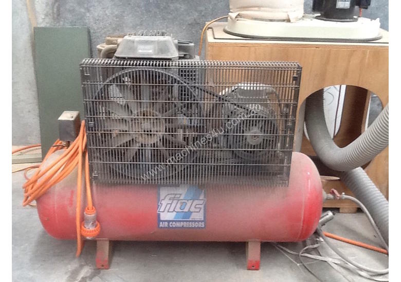 caption USED AIR COMPRESSOR