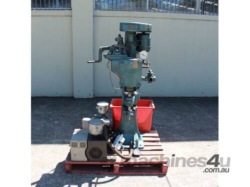 Vacuum Can Seamer.