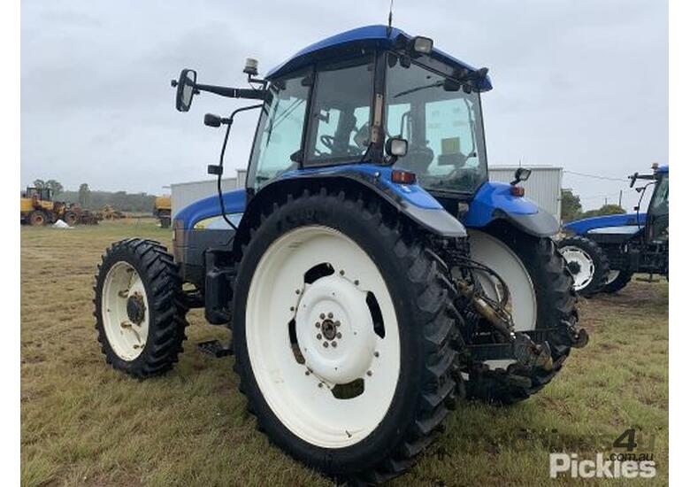caption New Holland TM120