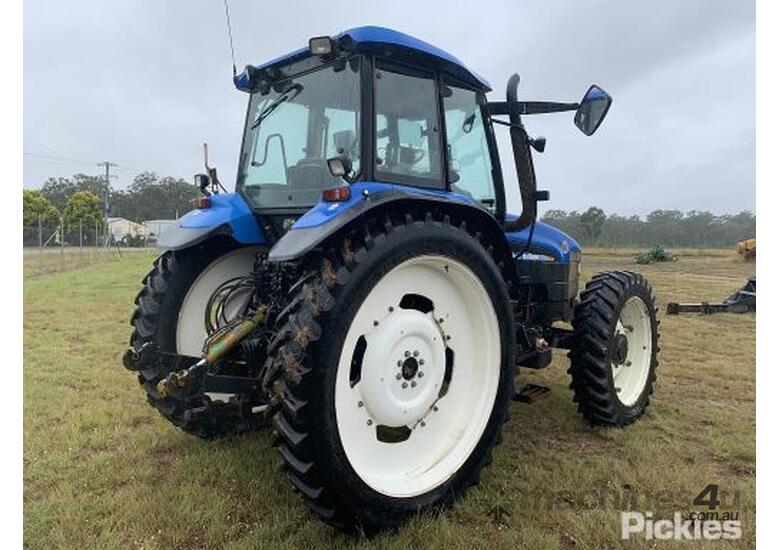 caption New Holland TM120
