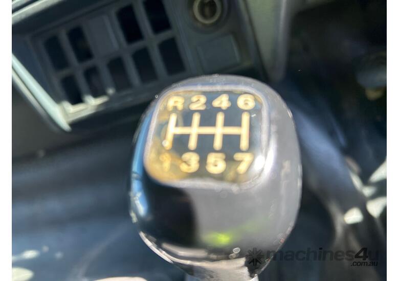 caption 2002 Nissan UD Curtainsider