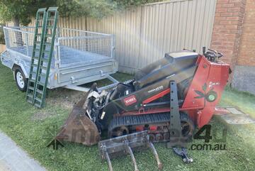 Toro TX525 Wide Track diesel mini loader, with Trailer & attachments