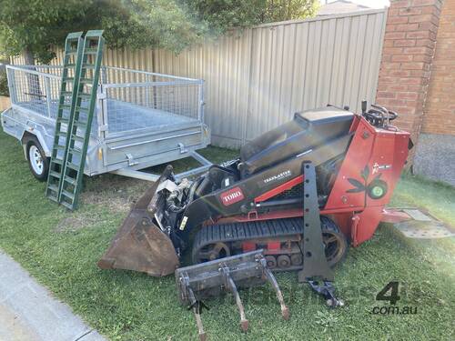 Toro TX525 Wide Track diesel mini loader, with Trailer & attachments