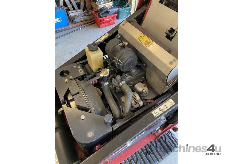 Toro TX525 Wide Track diesel mini loader, with Trailer & attachments