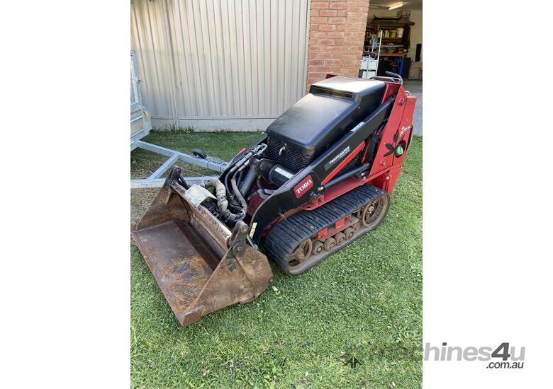 Toro TX525 Wide Track diesel mini loader, with Trailer & attachments