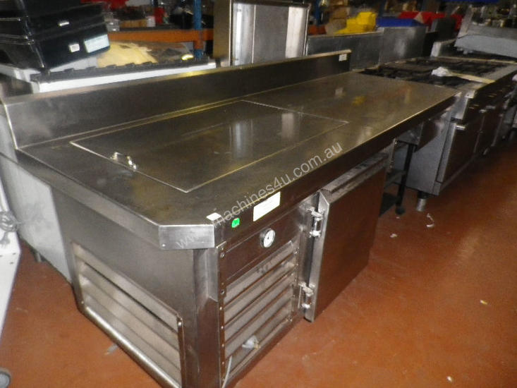 caption Second Hand Food Preparation with Underbar fridge