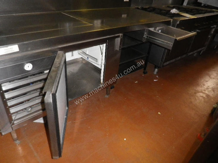 caption Second Hand Food Preparation with Underbar fridge