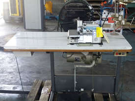 Industrial Sewing Machine Overlocker Singer on Table - picture2' - Click to enlarge