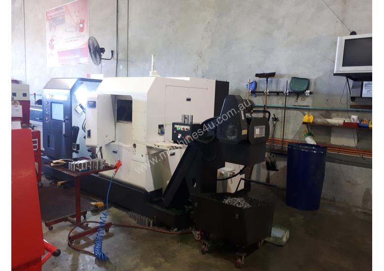 caption Used Twin Turret Cnc Lathe