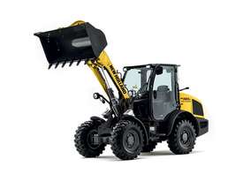 NEW HOLLAND W50C COMPACT WHEEL LOADER - picture0' - Click to enlarge