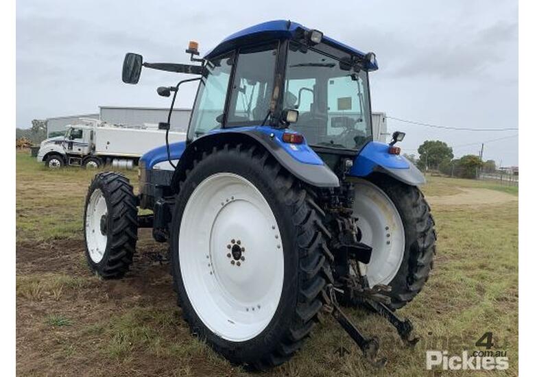 caption New Holland TM120