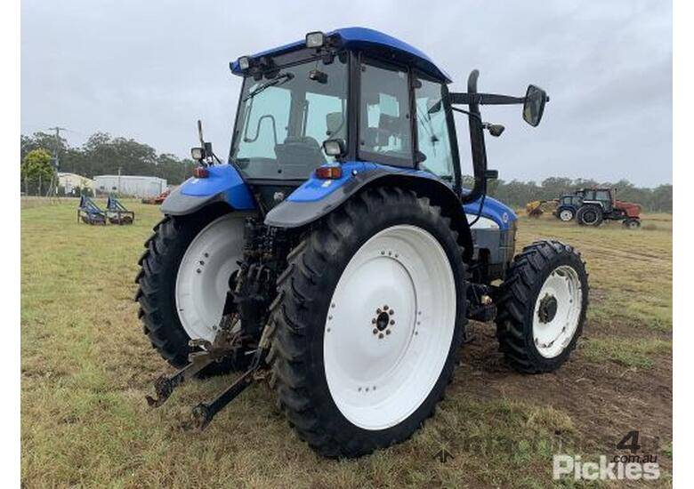caption New Holland TM120