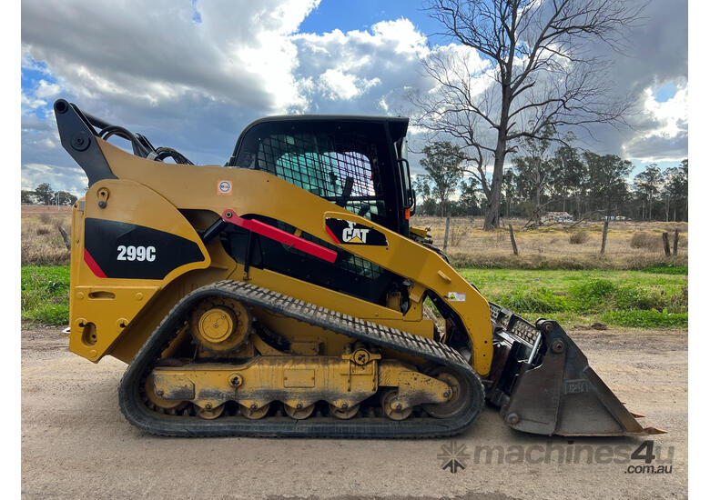 caption Caterpillar 299C Skid Steer Loader