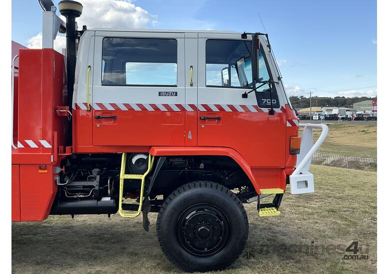 caption Isuzu FTS700 4x4 Dualcab Firetruck. Ex NSW Rural Fire Service.