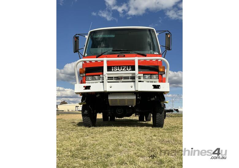 caption Isuzu FTS700 4x4 Dualcab Firetruck. Ex NSW Rural Fire Service.