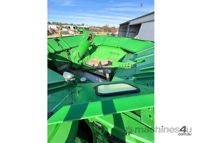 caption 2014 John Deere S670 Combines