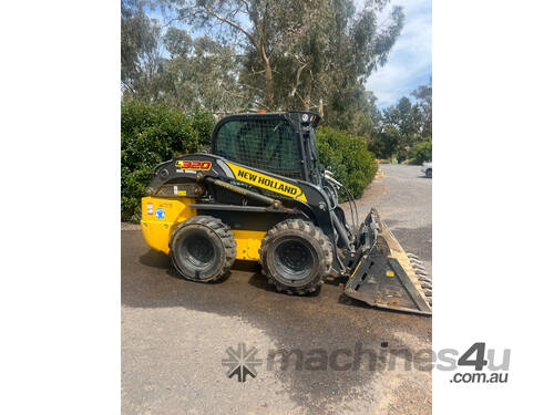 caption New Holland L320 Skid Steer Loader