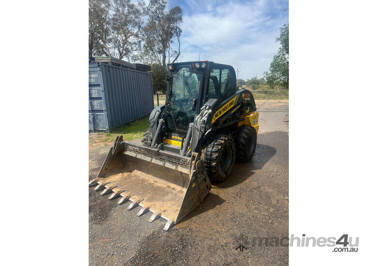 caption New Holland L320 Skid Steer Loader
