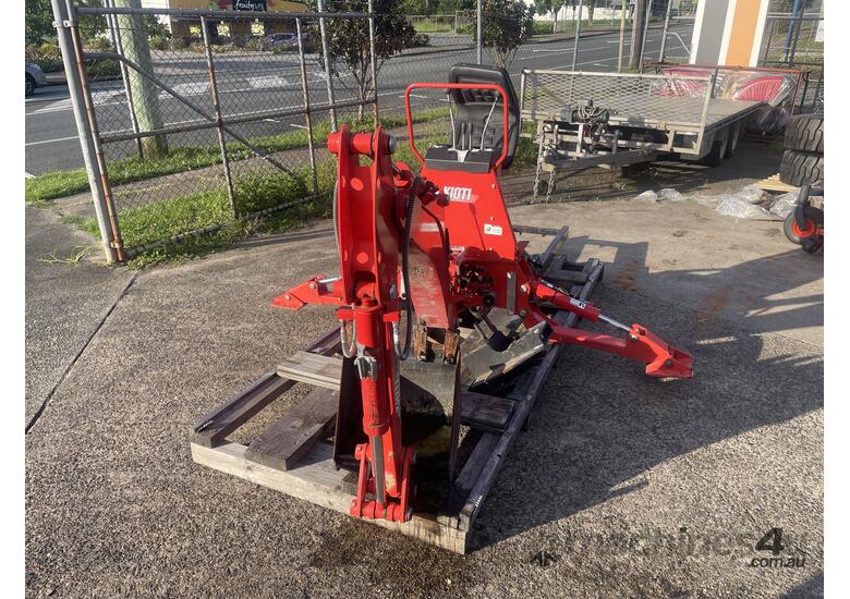 caption Backhoe with subframe mount