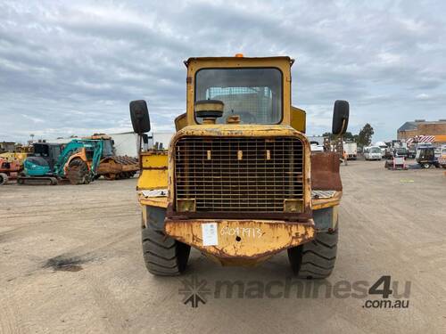 caption 1989 Volvo 861 Articulated Dump Truck