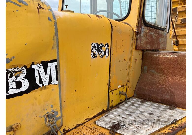 caption 1989 Volvo 861 Articulated Dump Truck