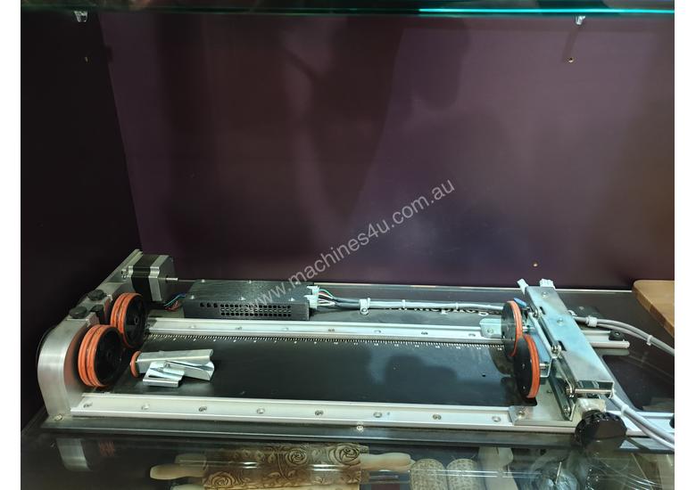 caption Epilog M2 Fusion dual source laser engraver