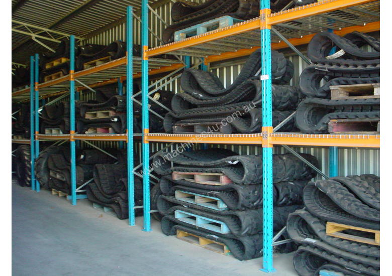 caption RUBBER TRACkS