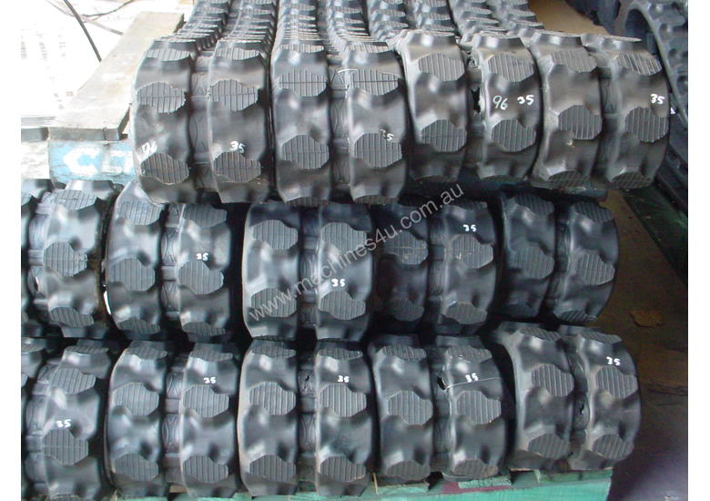 caption RUBBER TRACkS